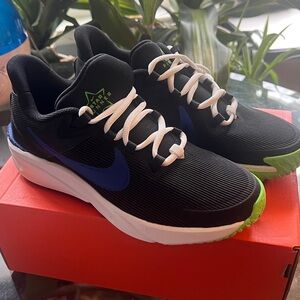 Nike Black Star Runner Sneakers with Blue and Green Highlights
